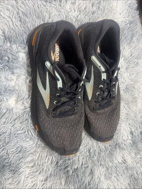 Brooks Black Sneakers with Mint Green Logo and Orange Details